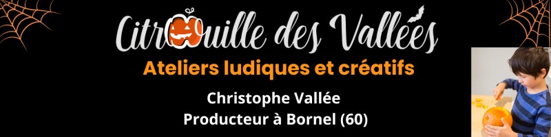 Christophe Vallée, producteur de citrouilles à Bornel (60), avec un enfant lors d'un atelier
